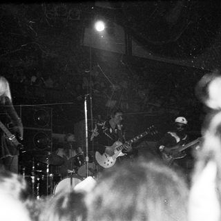 Live band performing on stage.