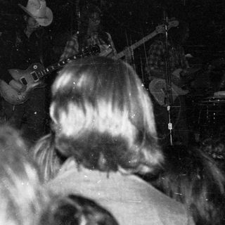 Live band performing on stage.