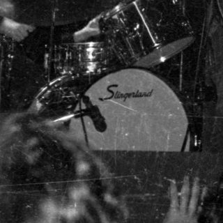 Live band performing on stage.