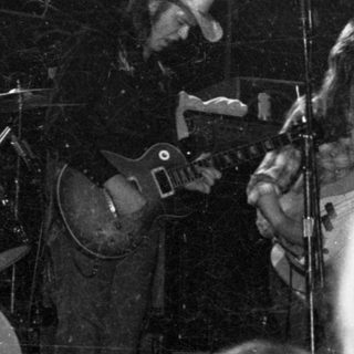 Live band performing on stage.