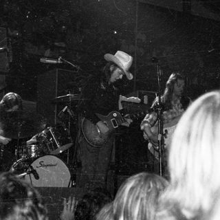 Live band performing on stage.