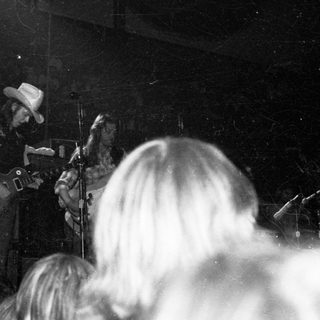 Live band performing on stage.