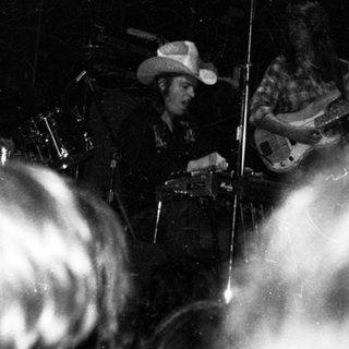 Live band performing on stage.