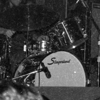 Live band performing on stage.