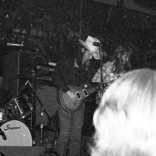 Live band performing on stage.