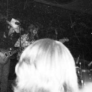 Live band performing on stage.