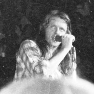 Live singer performing on stage.