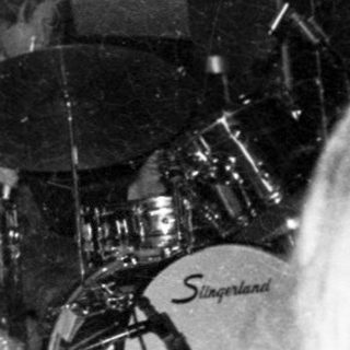 Live band performing on stage.