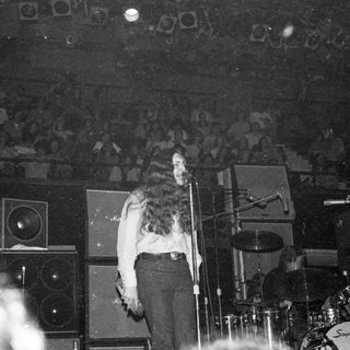 Live band performing on stage.