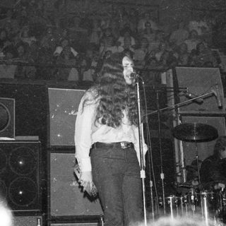 Live band performing on stage.