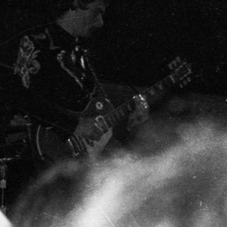 Live band performing on stage.