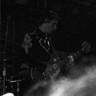 Live band performing on stage.