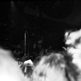 Live band performing on stage.