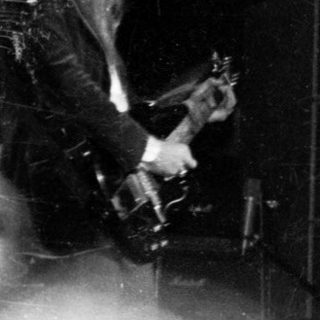 Live band performing on stage.