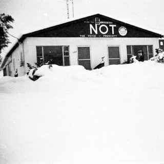 Snow-covered building labeled "NOT The Voice of Prescott."