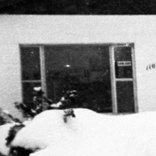 Snow-covered building labeled "NOT The Voice of Prescott."