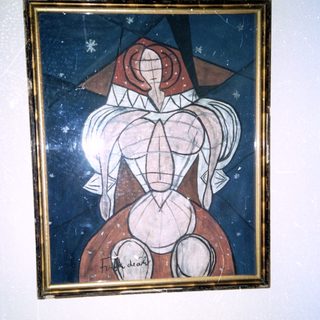 Abstract geometric female figure in blue.