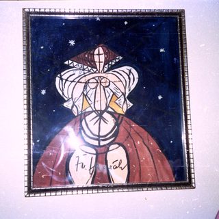 Stained glass portrait of woman in period headwear.