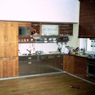 Kitchen under renovation with exposed walls and flooring.