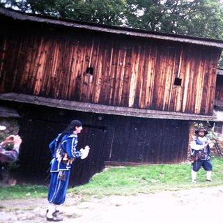 Historical reenactors in medieval-style armor.