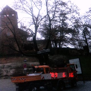 Medieval castle ruins with two towers.