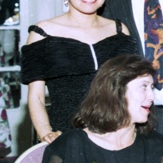 Family gathering at a formal indoor event.