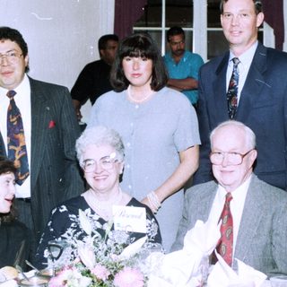 Family gathering at a formal indoor event.