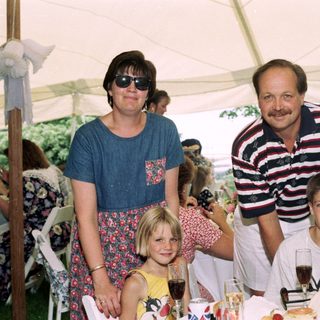 Family gathering at an outdoor event.