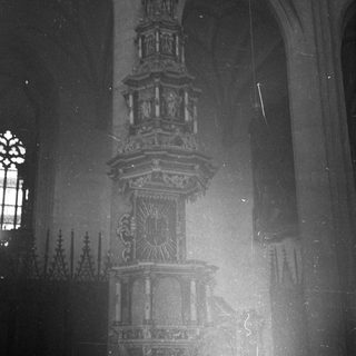 Ornate Gothic-style church pulpit with intricate carvings.