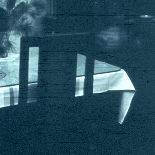 Reflection of vintage dining table with cake.