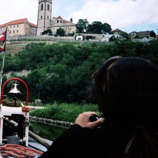 Boat tour with historic castle and church.