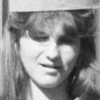 Homecoming queen in 1970s-style sash and crown.