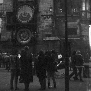 Historic astronomical clock on medieval building.