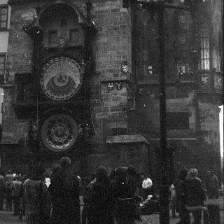Historic astronomical clock on medieval building.