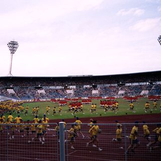 Pre-match stadium warm-up with team drills.