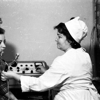 Medical procedure using early dental equipment.