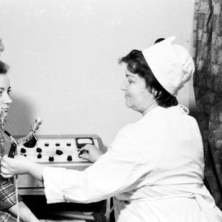 Medical procedure using early dental equipment.