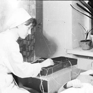 Medical procedure involving electroconvulsive therapy session.