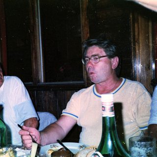 Two men dining together at a restaurant.