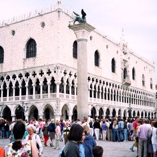 Venetian Doge's Palace with crowd in Piazza San Marco.