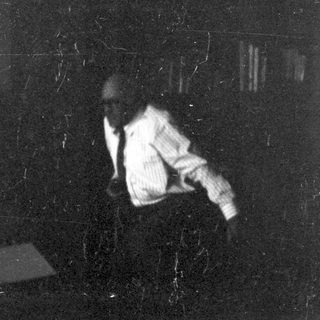 Blurry image of person falling or diving.