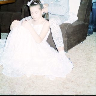 Two people preparing for an event indoors.
