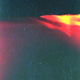 Bright lava flow at nighttime.