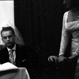 Newlywed couple at wedding ceremony.