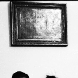 A wedding group portrait from the mid-20th century.