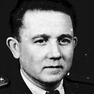Portrait of a man in military uniform.
