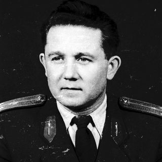 Military officer in formal portrait photograph.