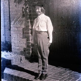 Vintage photograph of man in early 20th-century attire.