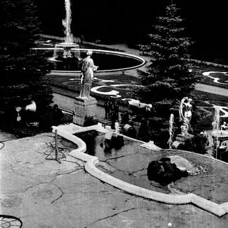 Elegant classical fountain garden with statues.