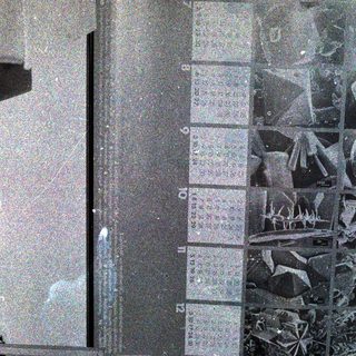 Vintage computer monitor displaying calendar and text.